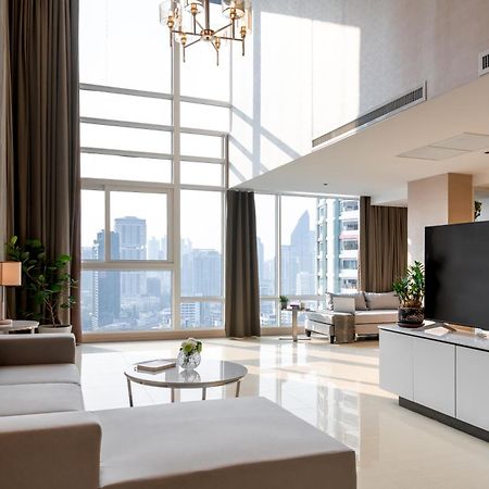 Jasmine 59 Hotel Bangkok Exterior foto A living room in a luxury apartment