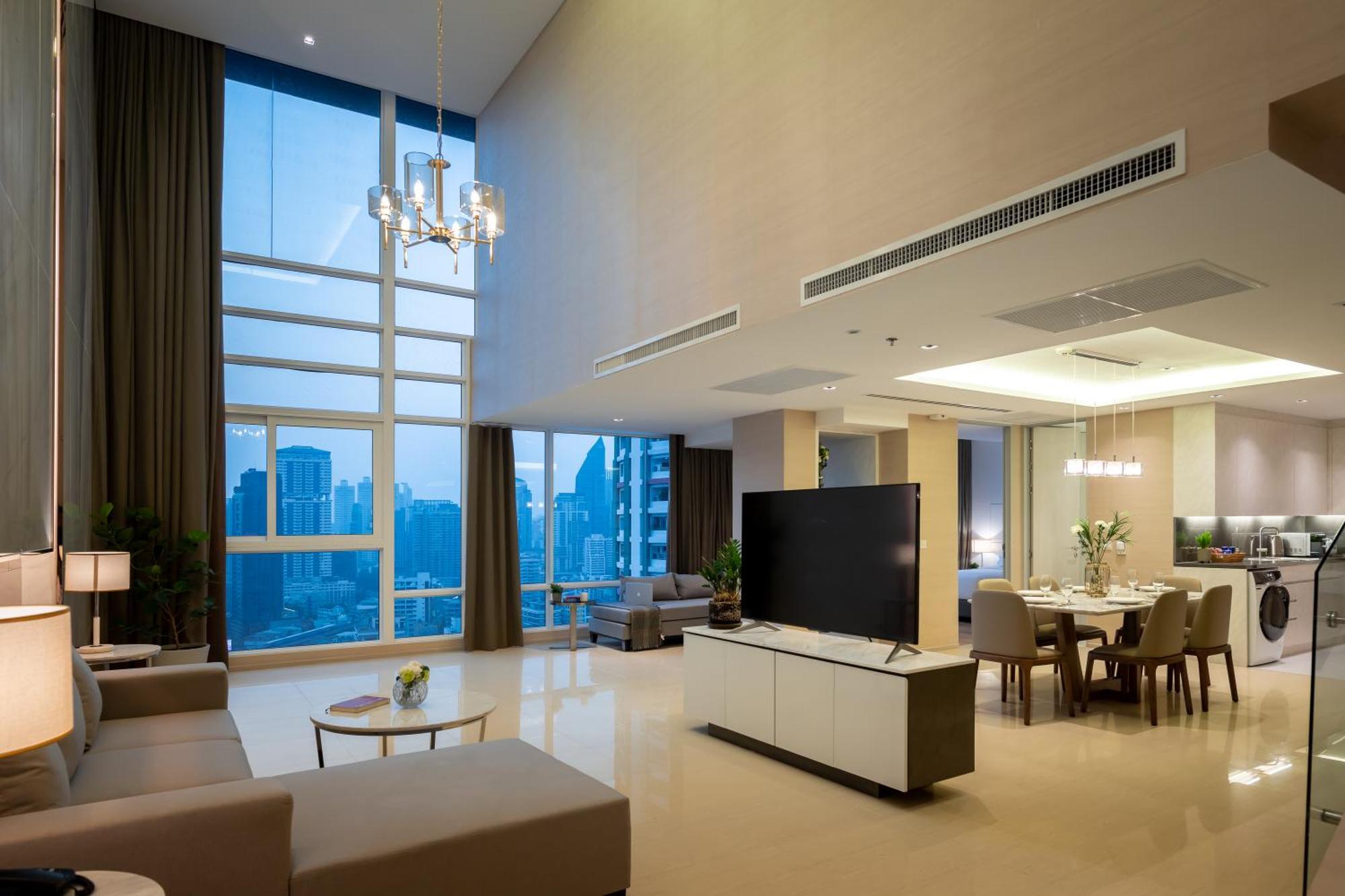 Jasmine 59 Hotel Bangkok Exterior foto A living room in a condominium