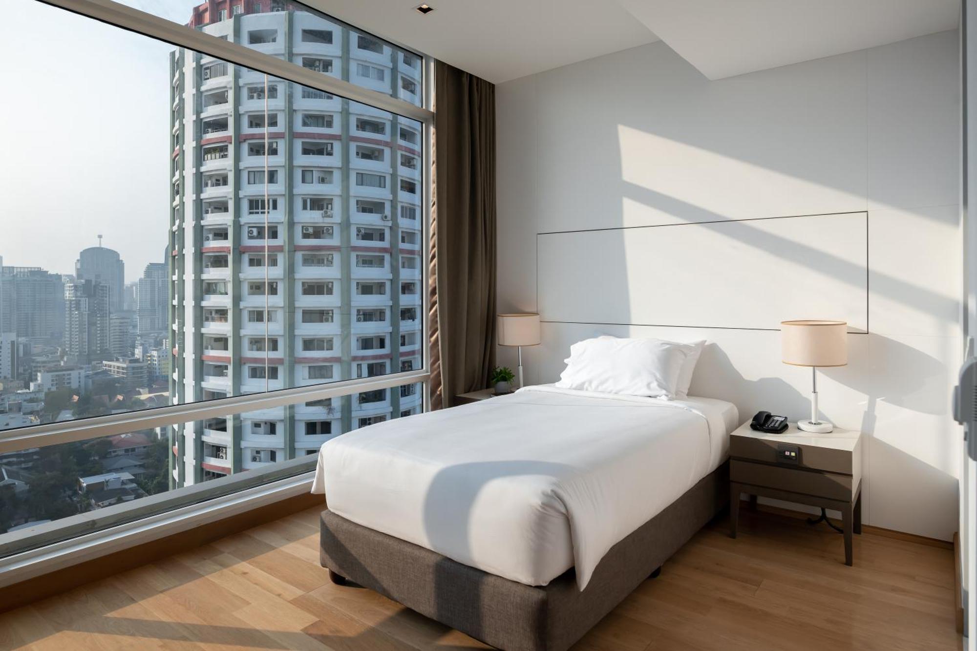 Jasmine 59 Hotel Bangkok Exterior foto A bedroom at the hotel
