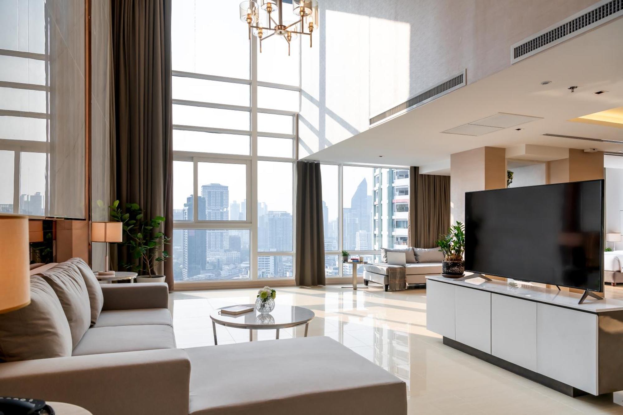 Jasmine 59 Hotel Bangkok Exterior foto A living room in a luxury apartment
